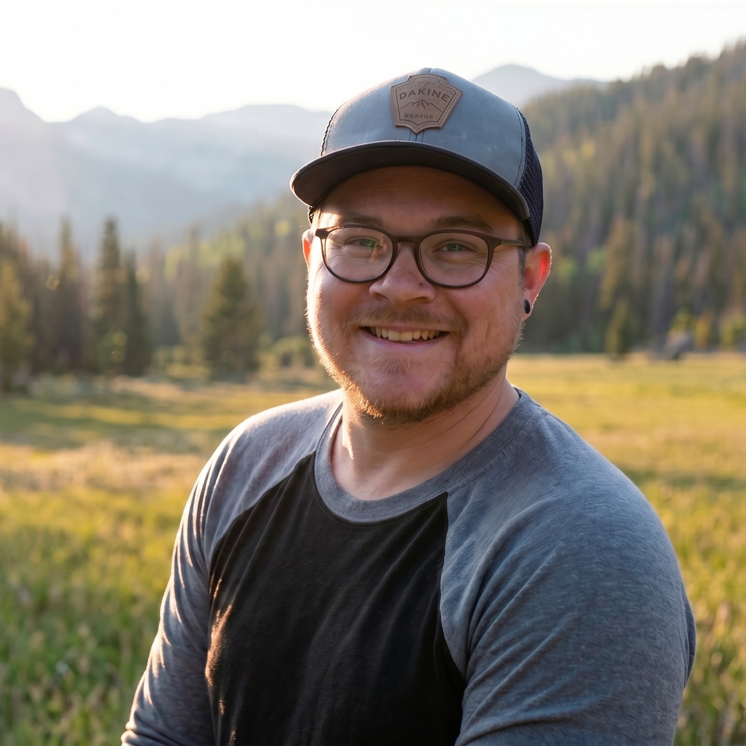 Cam Bruegger in a mountain meadow at golden hour